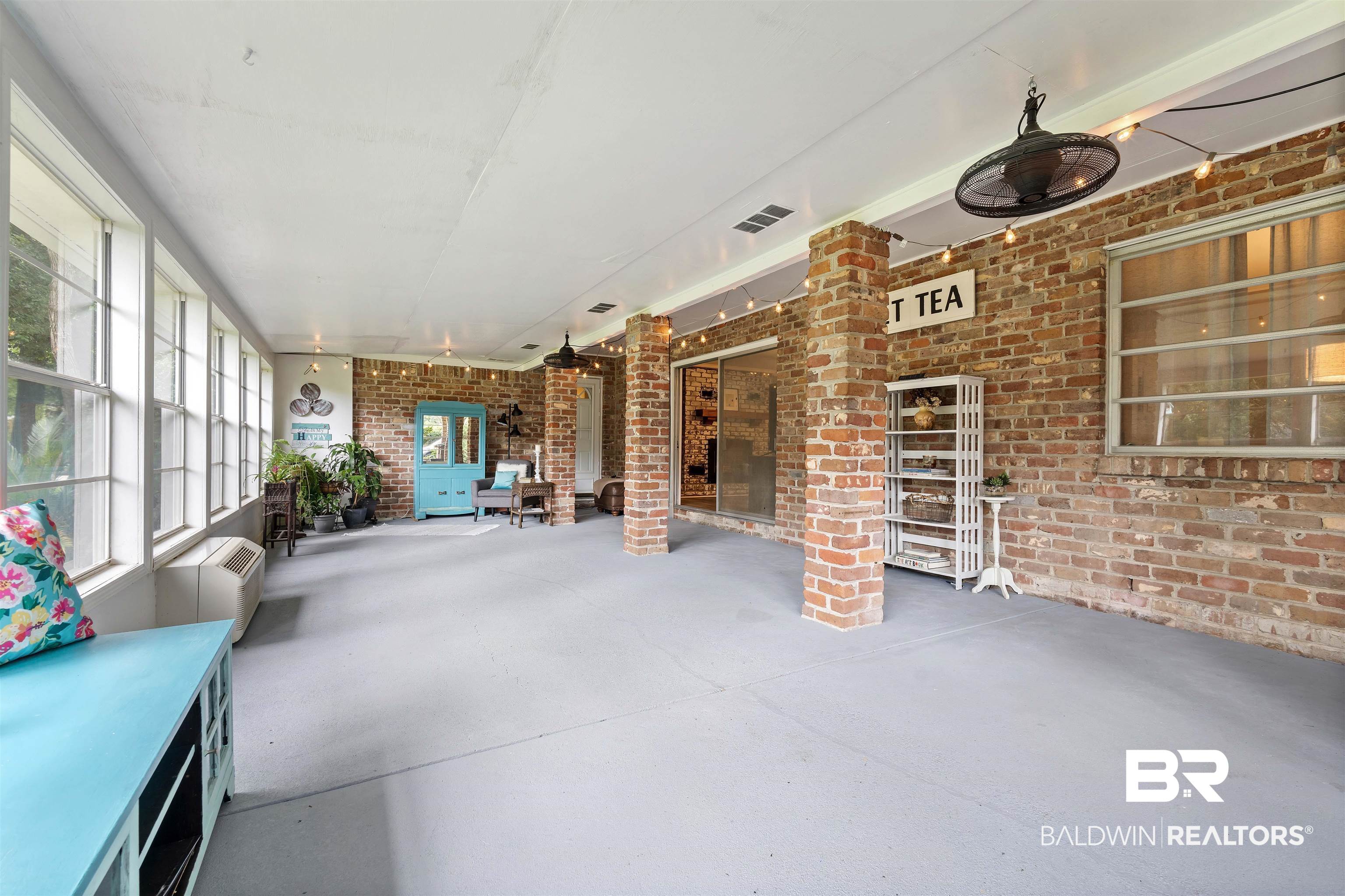 4051 East Canal Circle Mobile, AL 36619 - Photo 30 of 32 Unfurnished sunroom featuring ornate columns