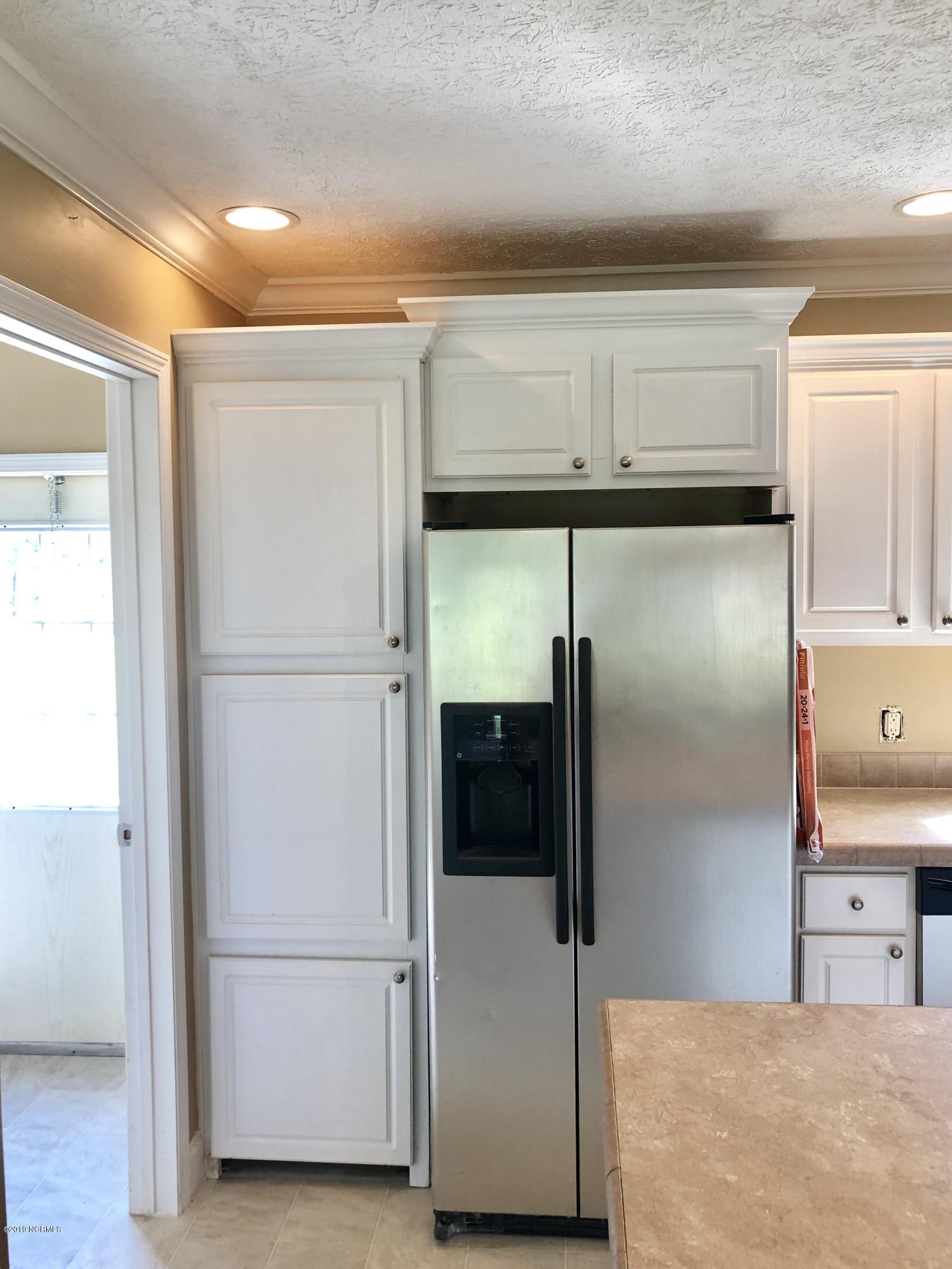 558 Newport Loop Road Newport, NC 28570 - Photo 26 of 31 pantry cabinet