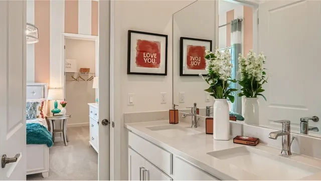 a bathroom with a sink a vanity and a mirror