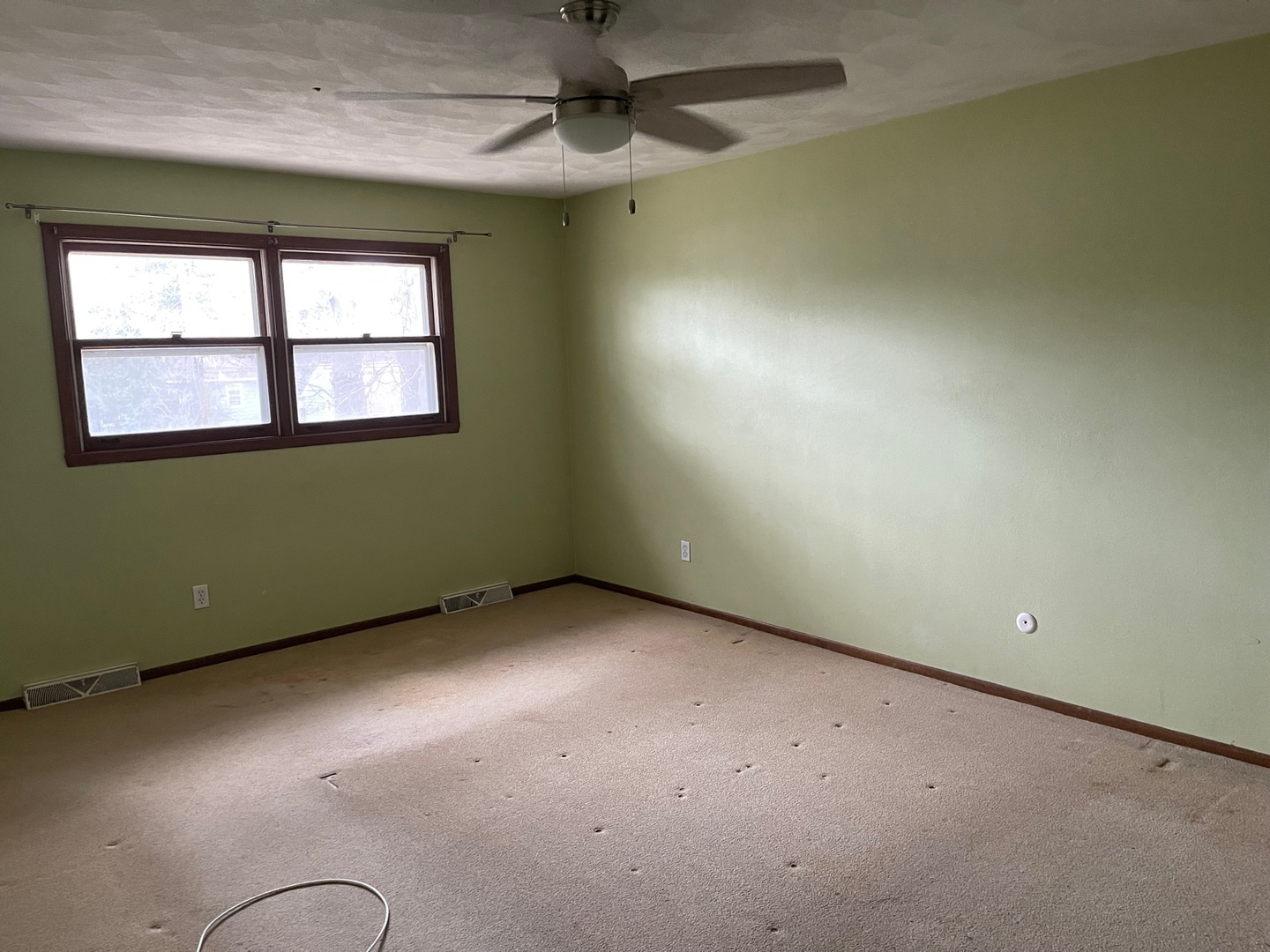 2013 Hickory Street Waukegan, IL 60087 - Photo 14 of 25 an empty room with a window