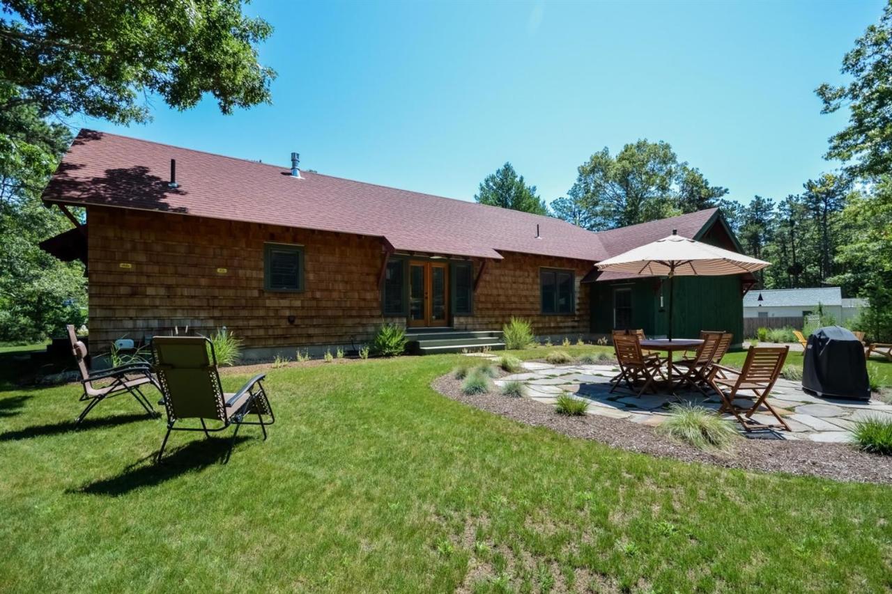 1336 Old Post Road Marstons Mills, MA 02648 - Photo 14 of 16 a view of a house with backyard tub and sitting area