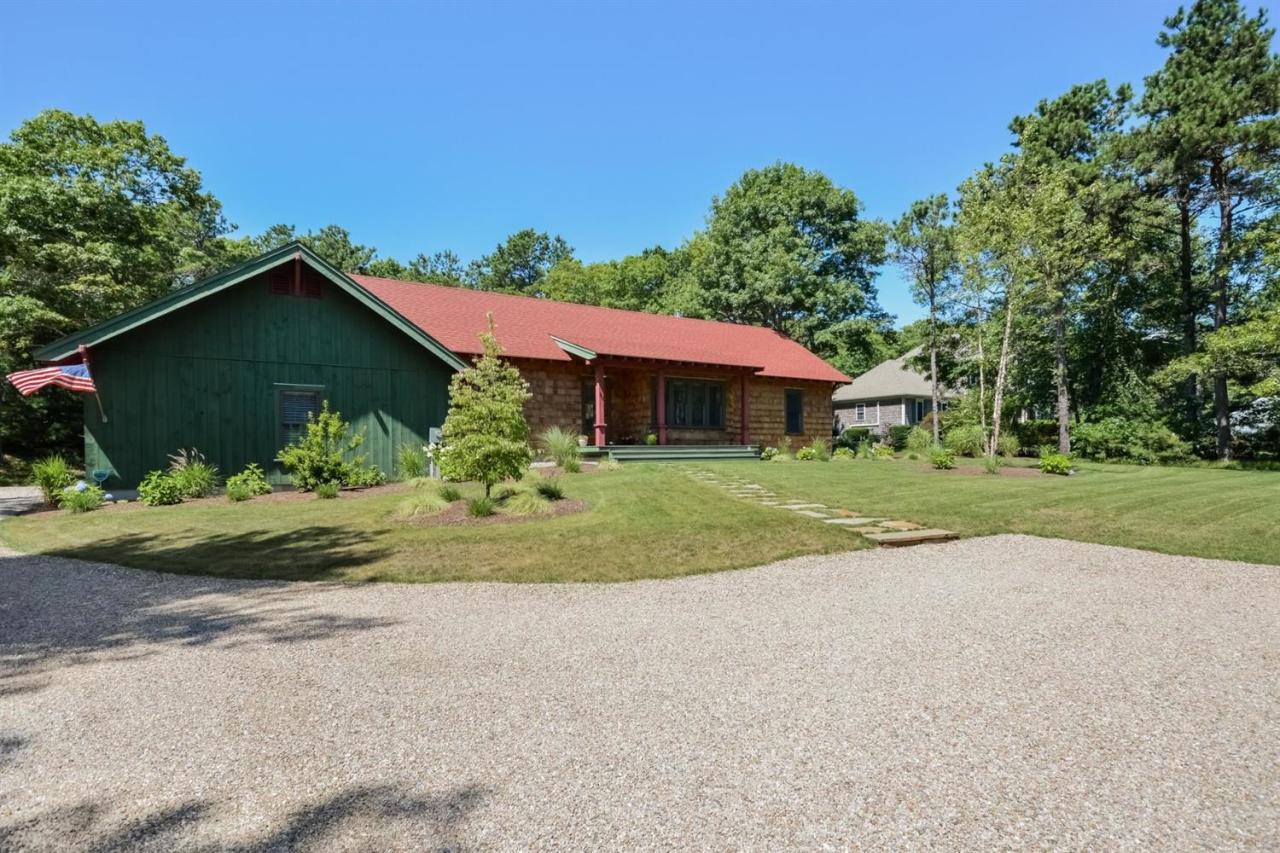 1336 Old Post Road Marstons Mills, MA 02648 - Photo 3 of 16 a view of a house with a yard