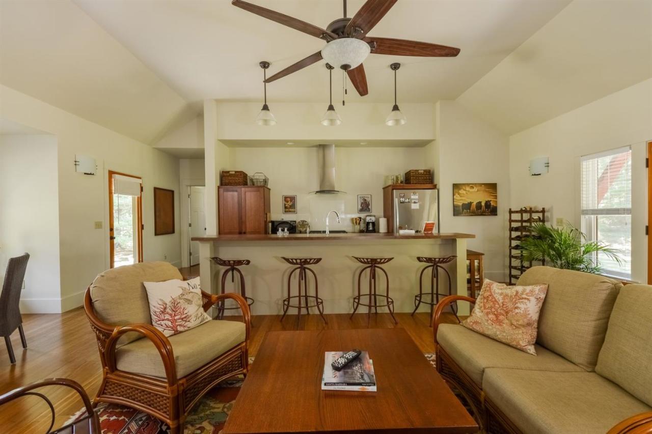 1336 Old Post Road Marstons Mills, MA 02648 - Photo 5 of 16 a living room with fireplace furniture and a chandelier