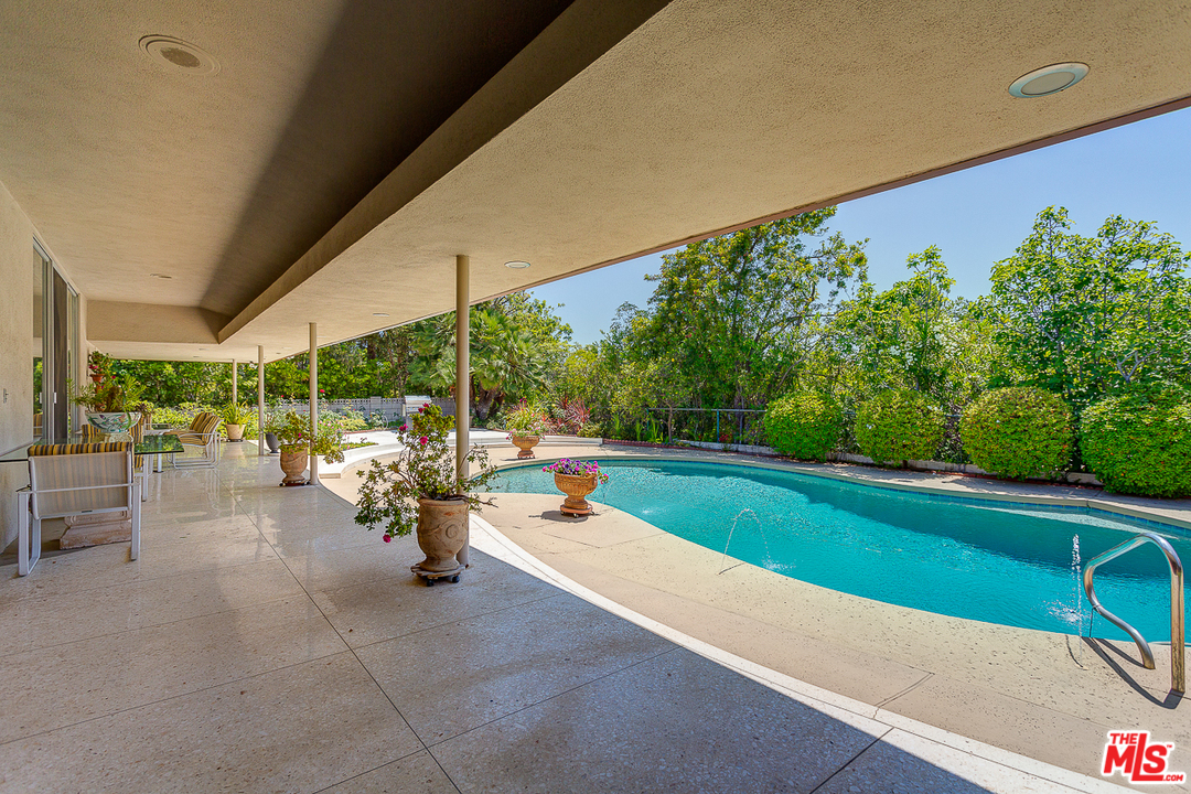 1040 Maybrook Drive Beverly Hills, CA 90210 - Photo 2 of 31 a view of a back yard with a patio