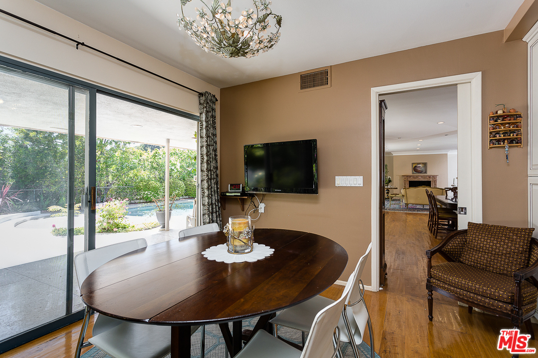 1040 Maybrook Drive Beverly Hills, CA 90210 - Photo 14 of 31 a view of a dining room with furniture window and outside view