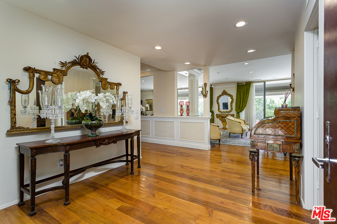1040 Maybrook Drive Beverly Hills, CA 90210 - Photo 5 of 31 a living room with furniture and wooden floor