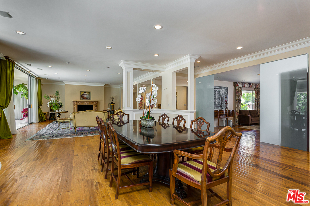 1040 Maybrook Drive Beverly Hills, CA 90210 - Photo 9 of 31 a dining room with furniture and wooden floor