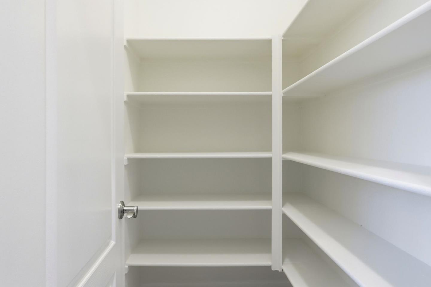 18800 Paprika Drive Morgan Hill, CA 95037 - Photo 14 of 64 a view of walk in closet with empty racks