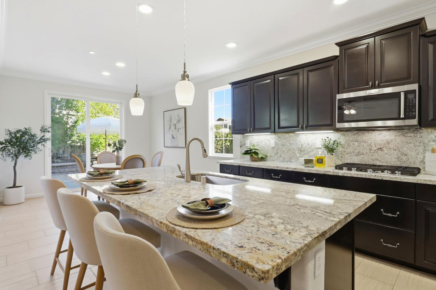 18800 Paprika Drive Morgan Hill, CA 95037 - Photo 18 of 64 a kitchen with granite countertop kitchen island granite countertop a sink and cabinets