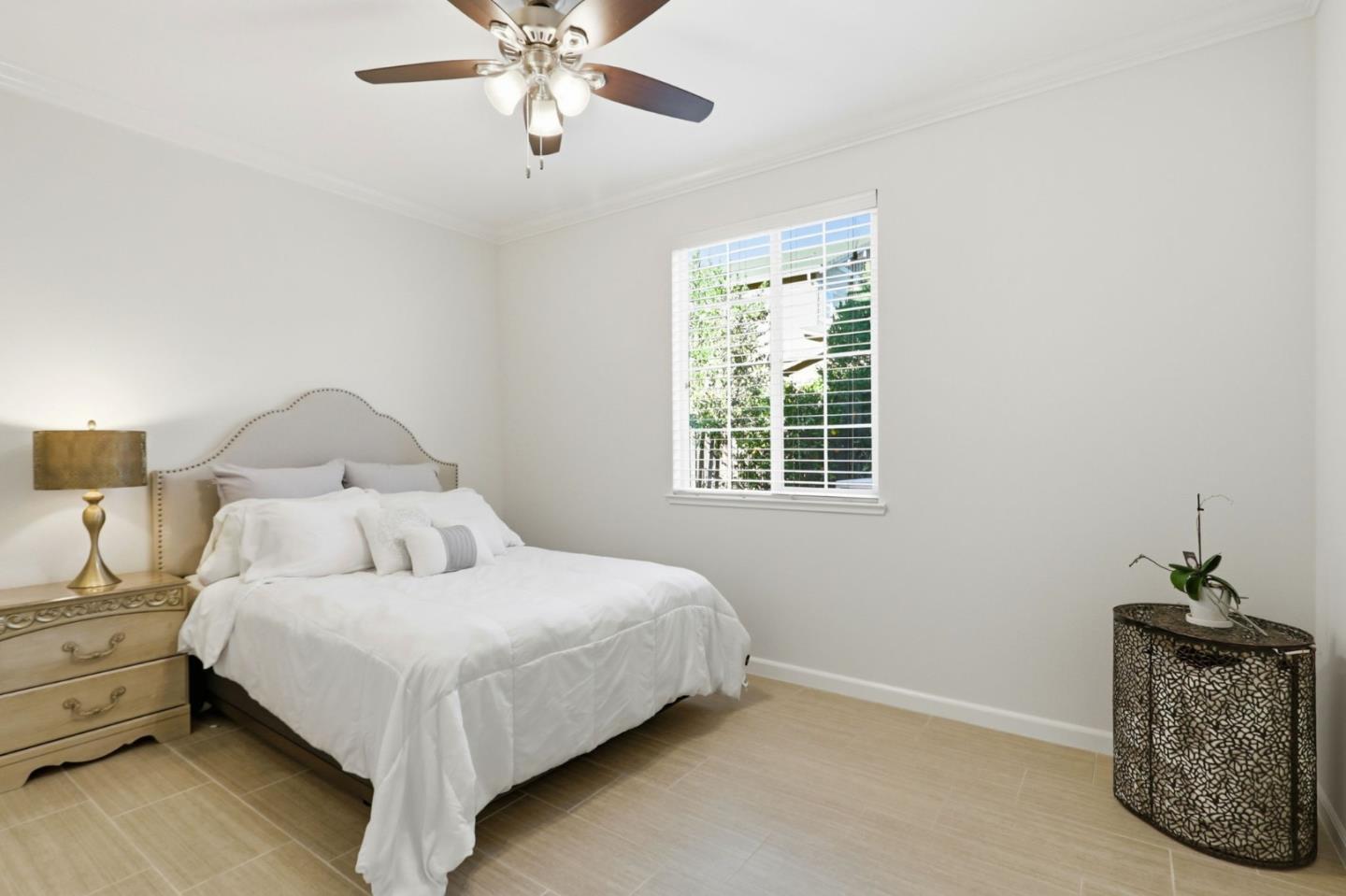 18800 Paprika Drive Morgan Hill, CA 95037 - Photo 28 of 64 a bedroom with a bed and a window