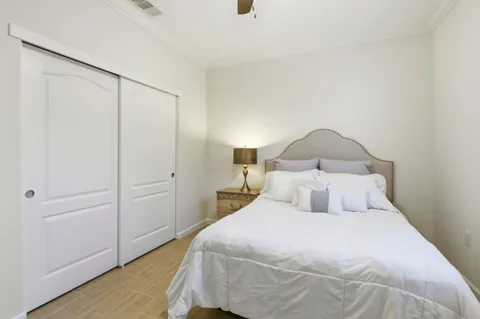 en view interior of a house with wooden floor and windows