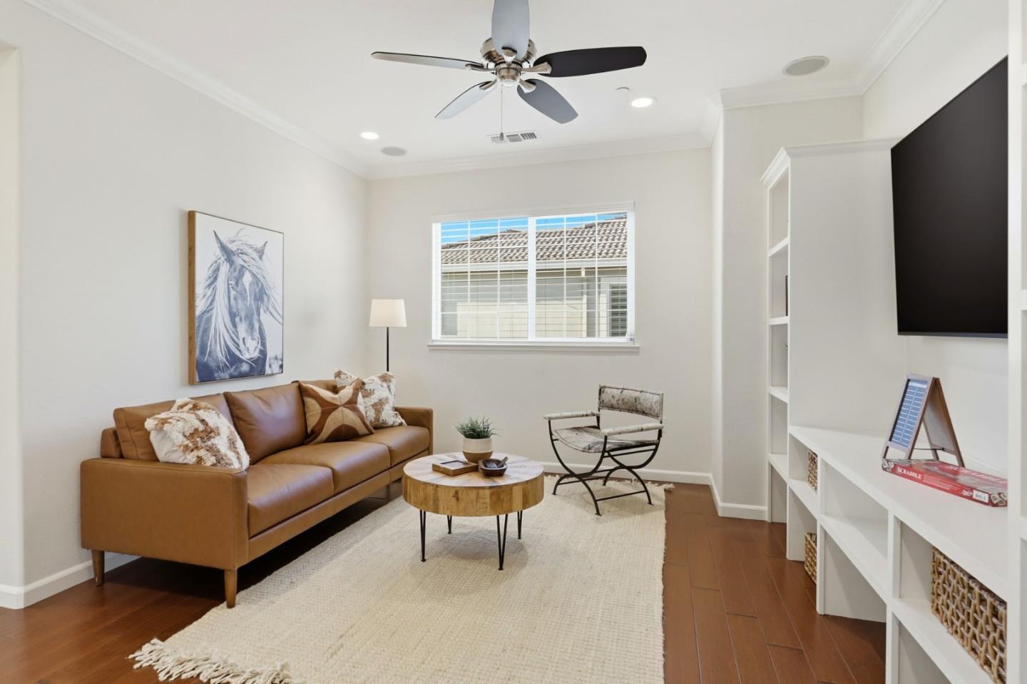 18800 Paprika Drive Morgan Hill, CA 95037 - Photo 35 of 64 a living room with furniture and a flat screen tv