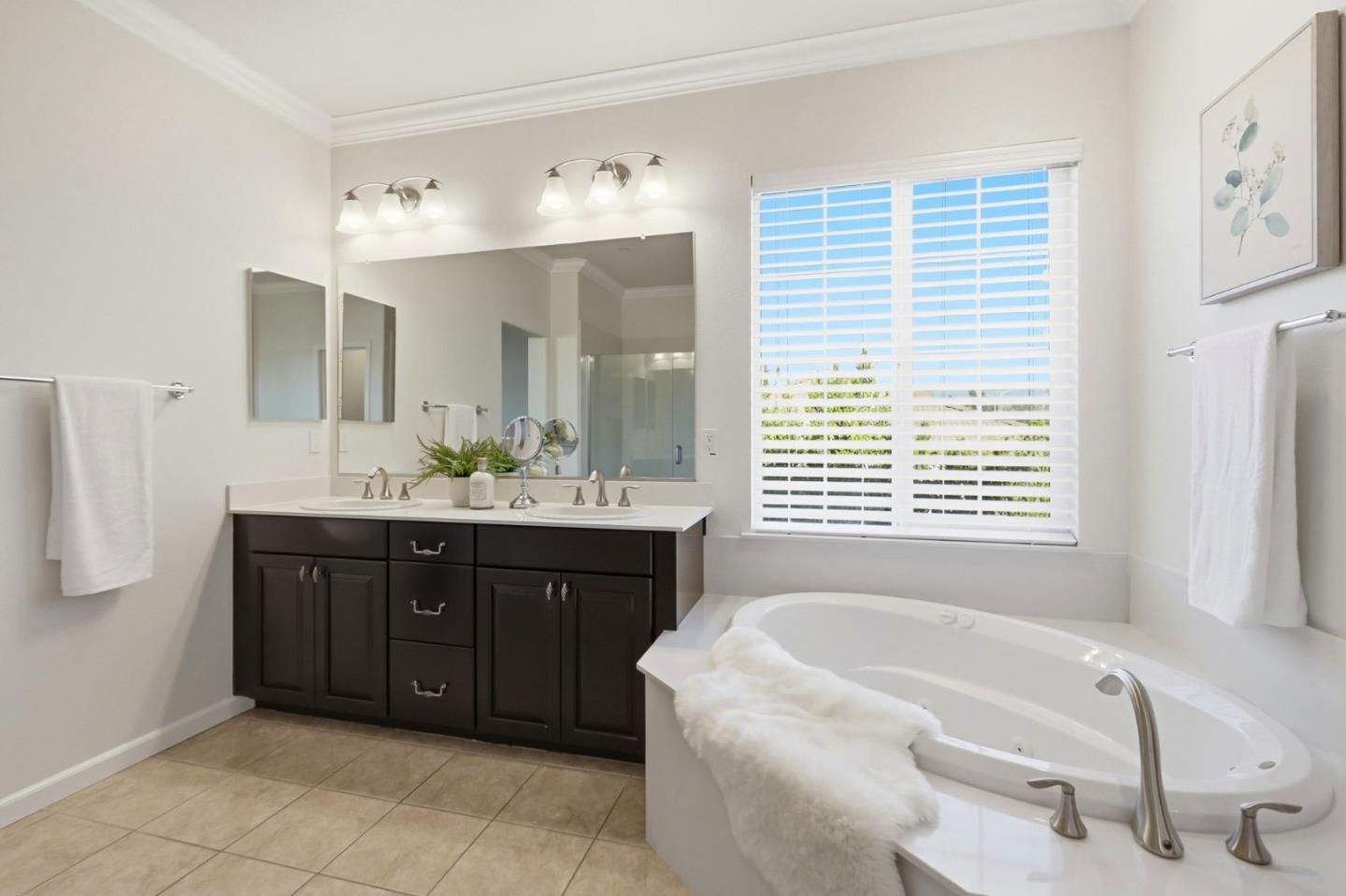 18800 Paprika Drive Morgan Hill, CA 95037 - Photo 51 of 64 a bathroom with a tub sink and mirror