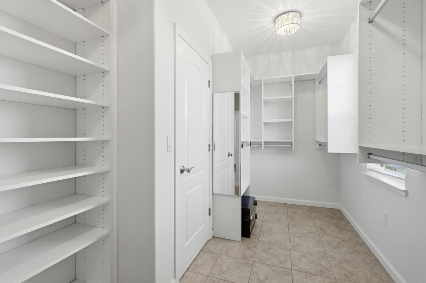 18800 Paprika Drive Morgan Hill, CA 95037 - Photo 54 of 64 a view of walk in closet with empty racks