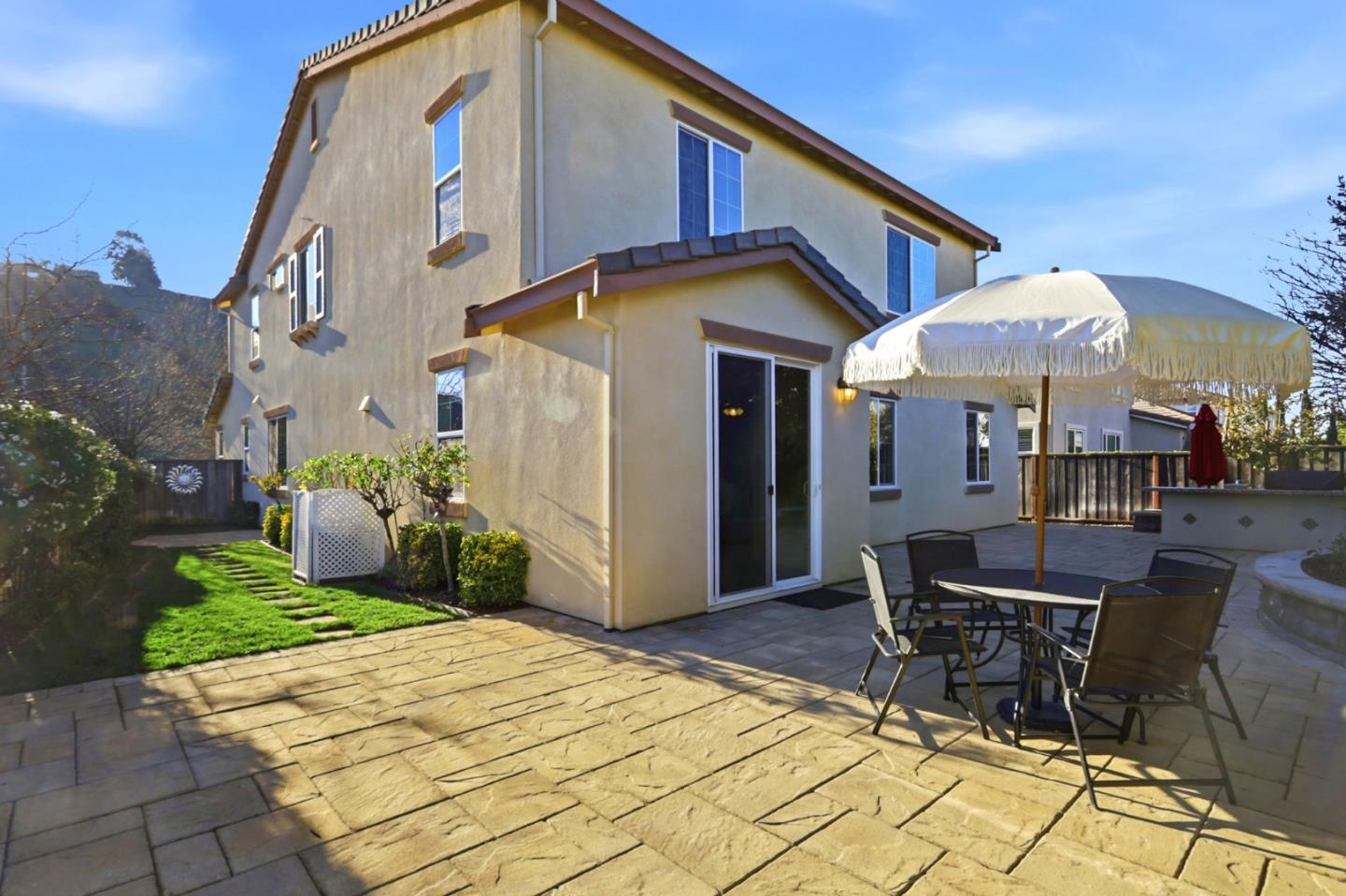 18800 Paprika Drive Morgan Hill, CA 95037 - Photo 56 of 64 a view of a house with backyard and sitting area