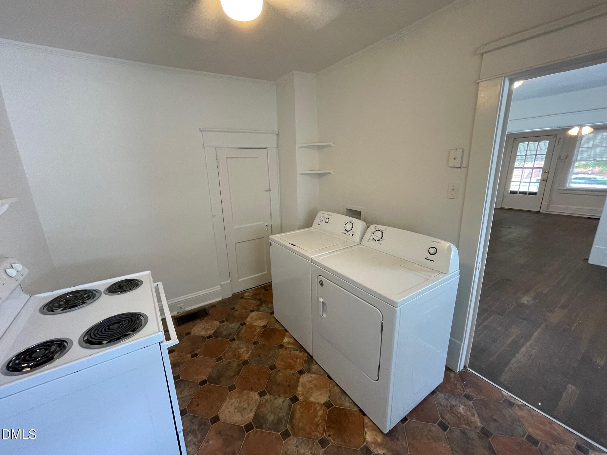 404 Chamberlain Street, Unit A Raleigh, NC 27607 - Photo 7 of 12 a utility room with dryer and washer