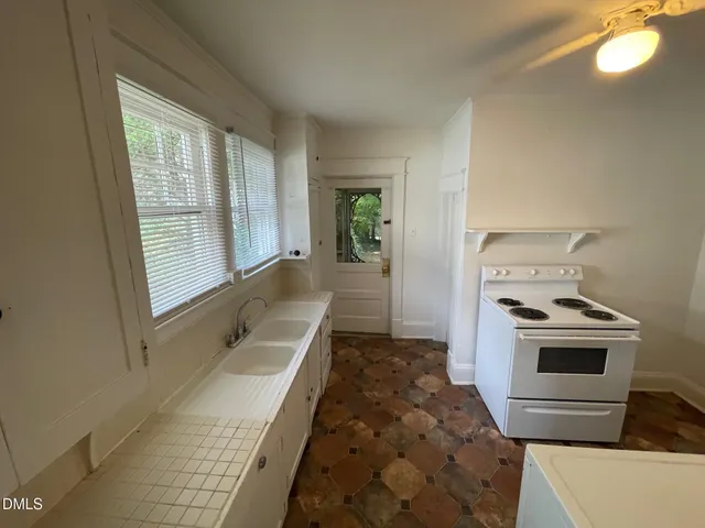 a bathroom with a sink and a bathtub