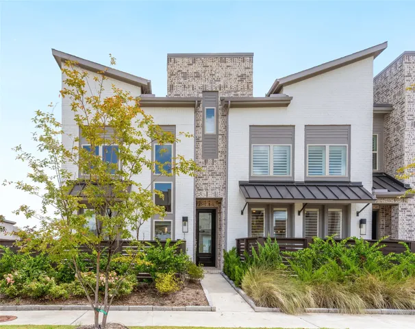 a front view of a multi story residential apartment building