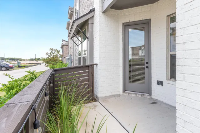 a view of a house with backyard and ocean view