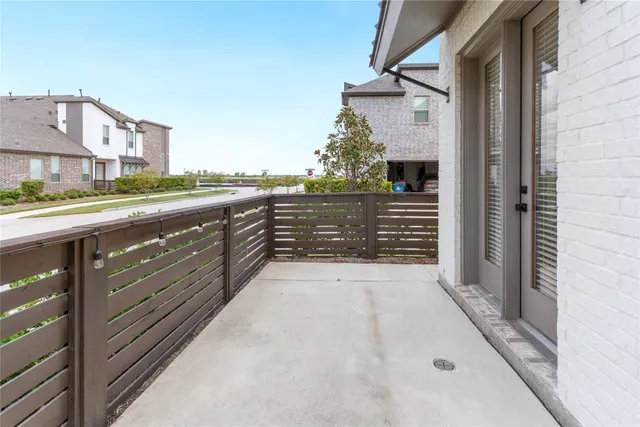 a view of a white building among the street