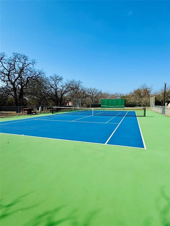 36060 Cedar Ridge Drive Whitney, TX 76692 - Photo 5 of 10 a view of a tennis court