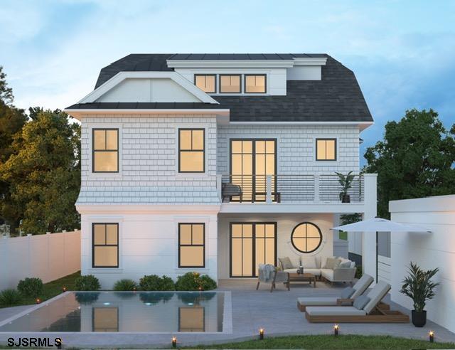 905 Seacrest Road Ocean City, NJ 08226 - Photo 2 of 18 a front view of house with yard and outdoor seating