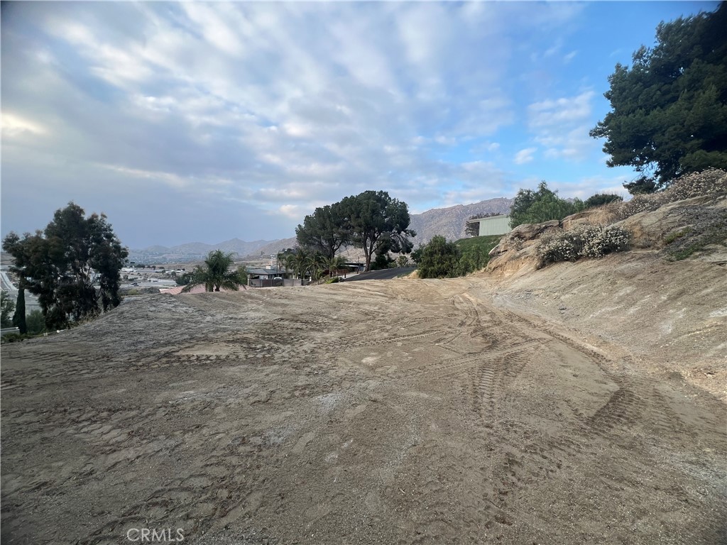 20254 West Point Drive Riverside, CA 92507 - Photo 7 of 7 a view of a dry yard with wooden fence