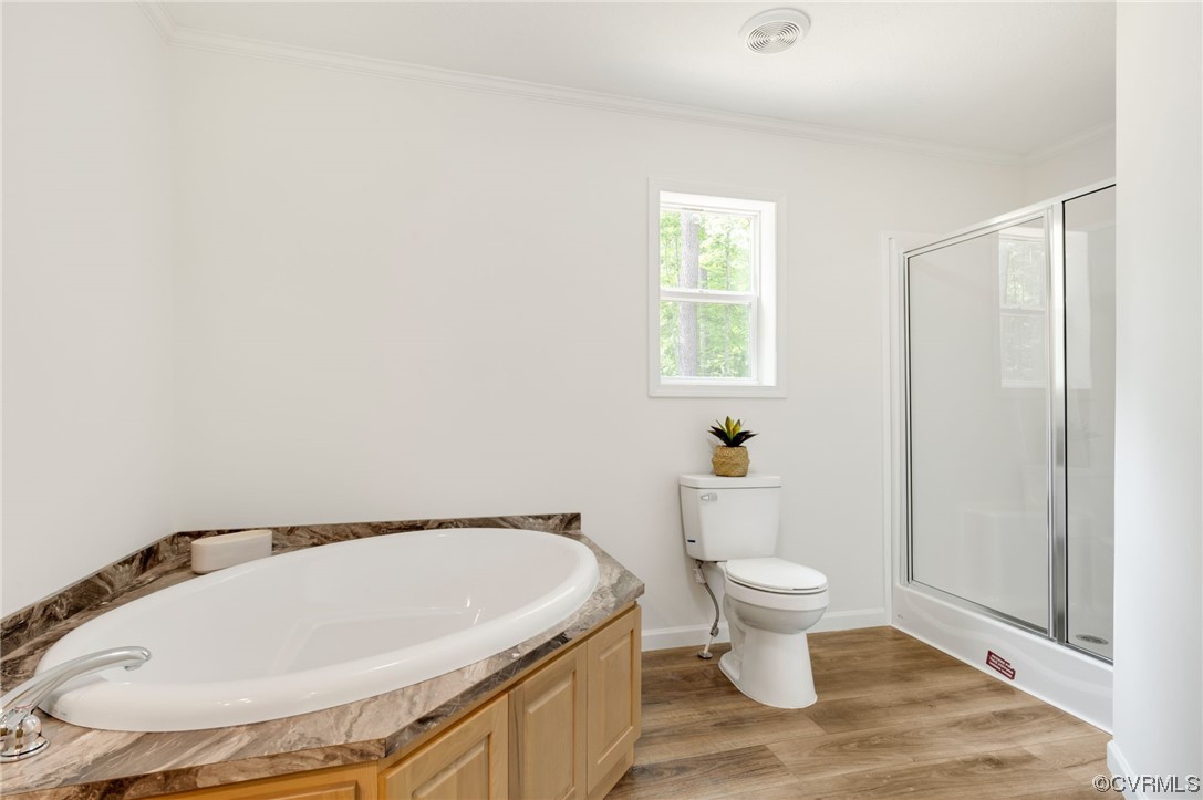1055 Eastham Road Bumpass, VA 23024 - Photo 14 of 42 a bathroom with a toilet and a sink
