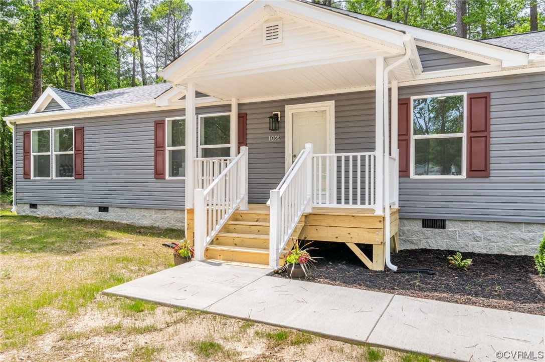 1055 Eastham Road Bumpass, VA 23024 - Photo 2 of 42 a view of a house with backyard and sitting area
