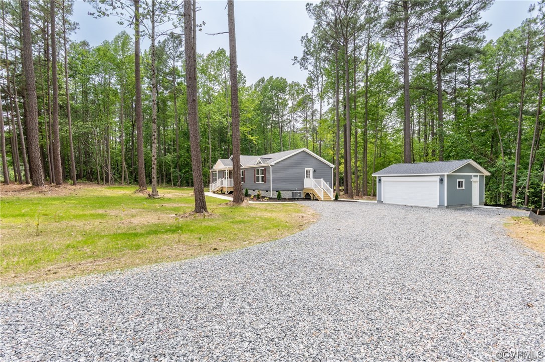 1055 Eastham Road Bumpass, VA 23024 - Photo 27 of 42 a house view with a outdoor space