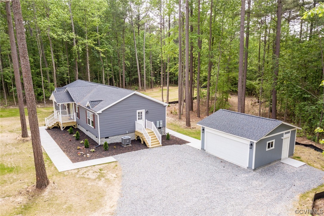 1055 Eastham Road Bumpass, VA 23024 - Photo 28 of 42 an aerial view of a house having yard