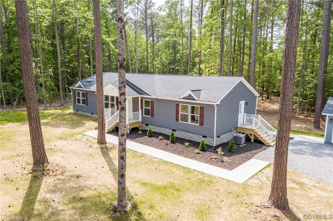 1055 Eastham Road Bumpass, VA 23024 - Photo 29 of 42 a view of house with a yard