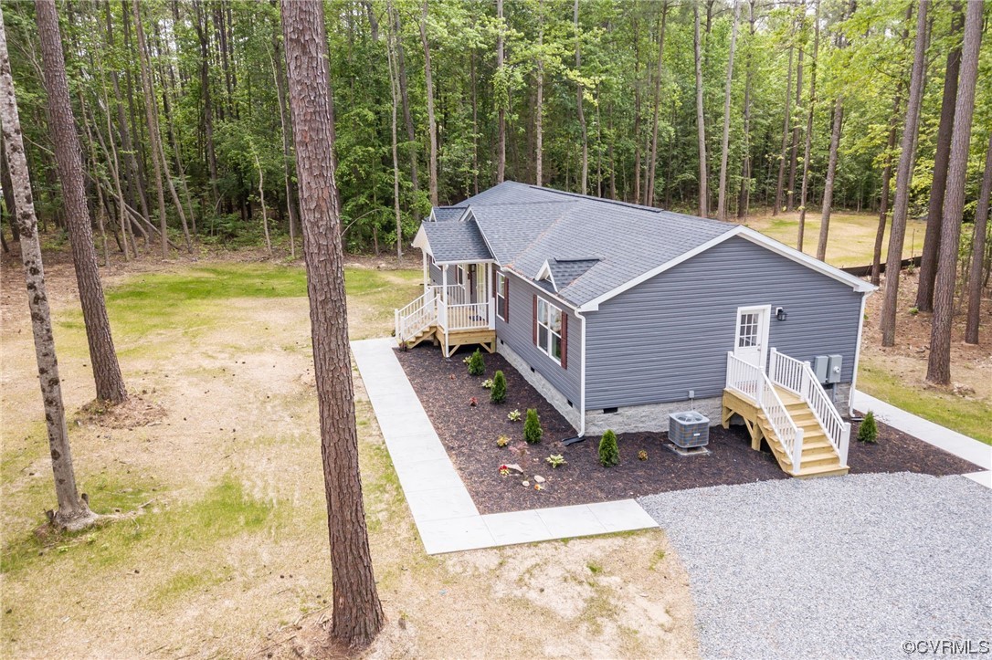 1055 Eastham Road Bumpass, VA 23024 - Photo 41 of 42 a view of a house with backyard