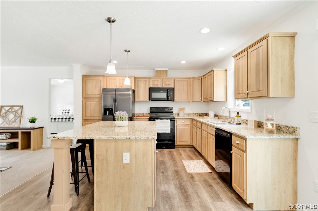 1055 Eastham Road Bumpass, VA 23024 - Photo 8 of 42 a large kitchen with stainless steel appliances granite countertop a stove top oven a refrigerator a sink dishwasher and white cabinets with wooden floor