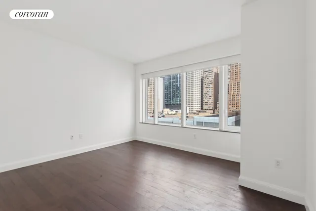a kitchen with granite countertop a stove and a sink