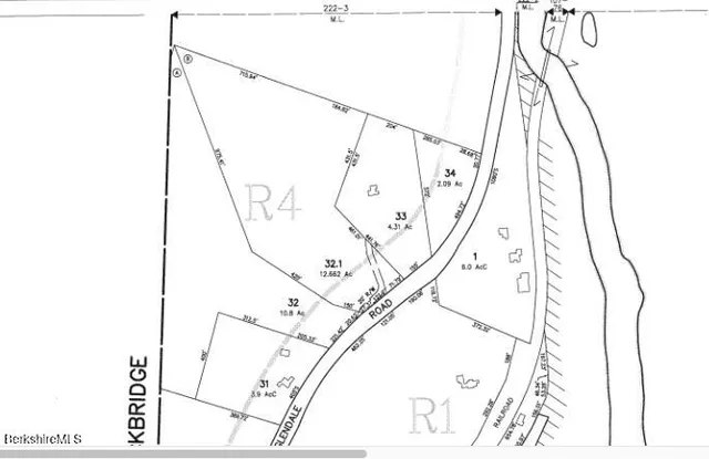 a view of a living room with a large window