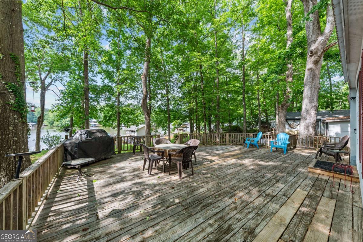 194 Phillips Road Eatonton, GA 31024 - Photo 41 of 57 a view of a backyard with sitting area