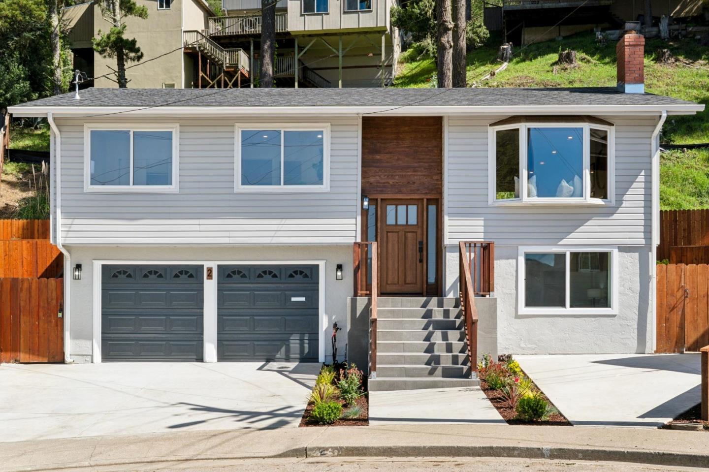 2 Celia Court Pacifica, CA 94044 - Photo 1 of 47 a front view of a house with garden