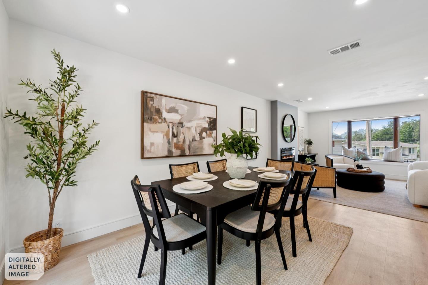 2 Celia Court Pacifica, CA 94044 - Photo 18 of 47 a view of a dining room with furniture and a potted plant