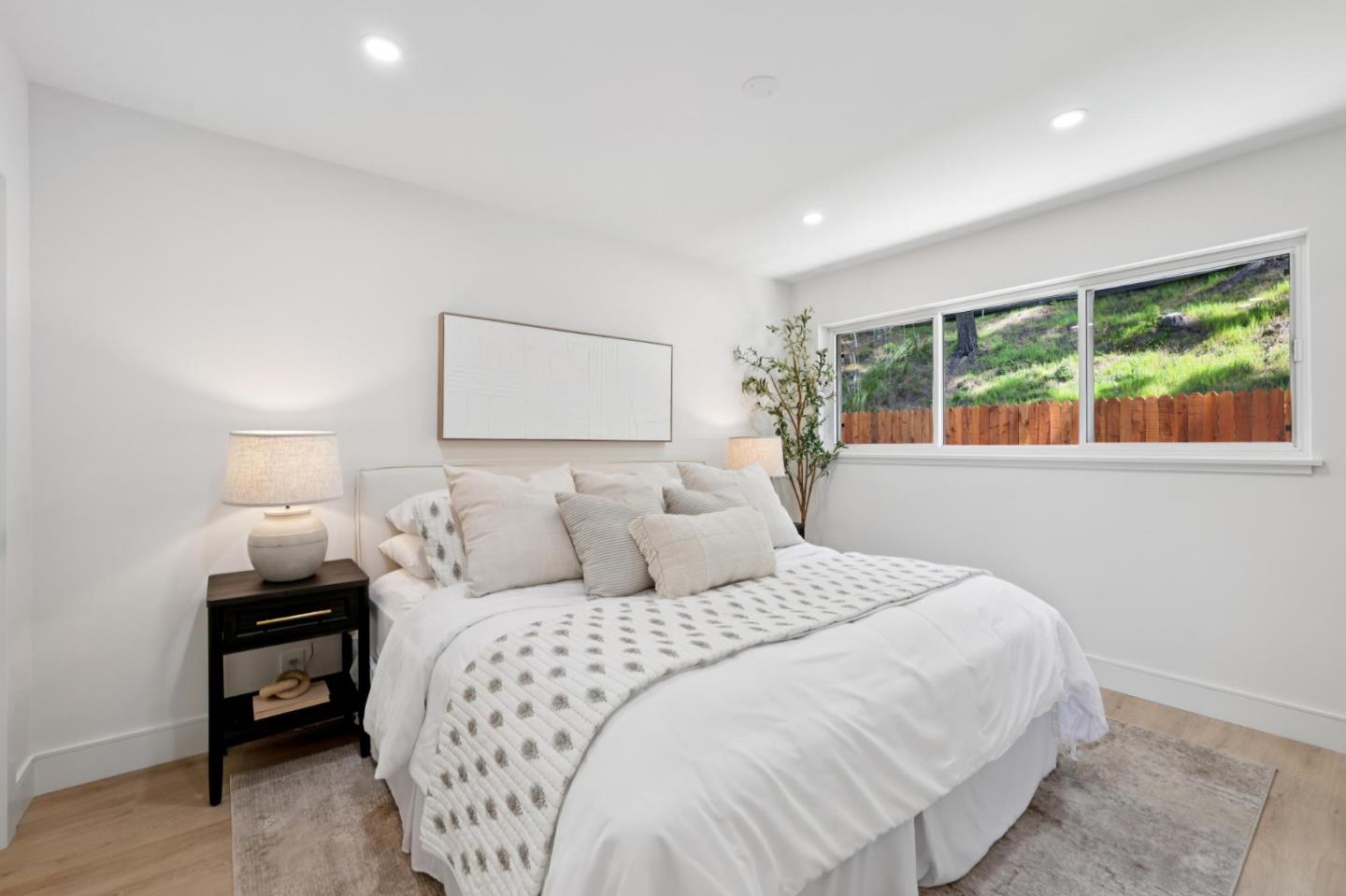 2 Celia Court Pacifica, CA 94044 - Photo 20 of 47 a bedroom with a bed and a large window