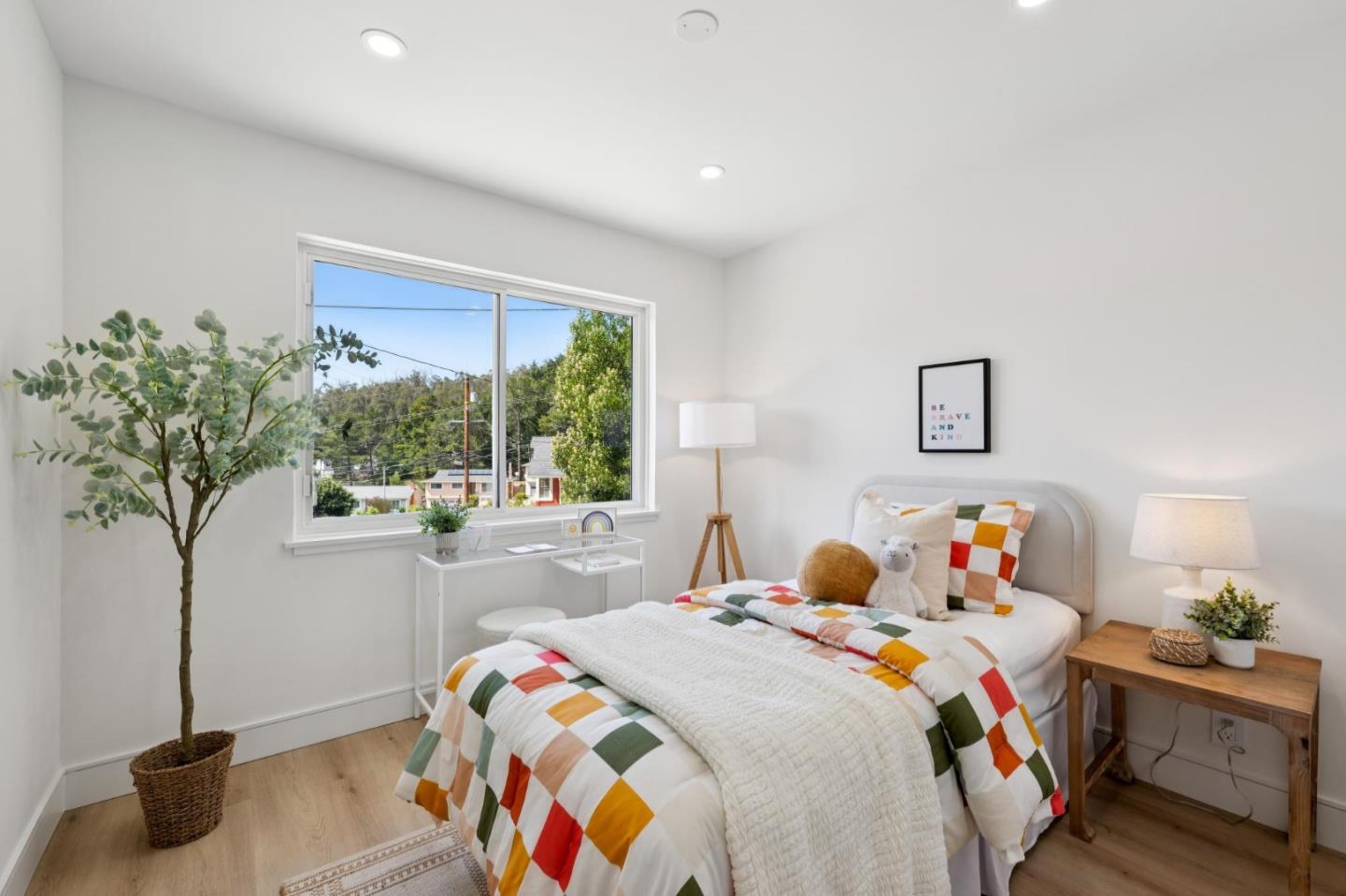 2 Celia Court Pacifica, CA 94044 - Photo 23 of 47 a bedroom with bed and a window
