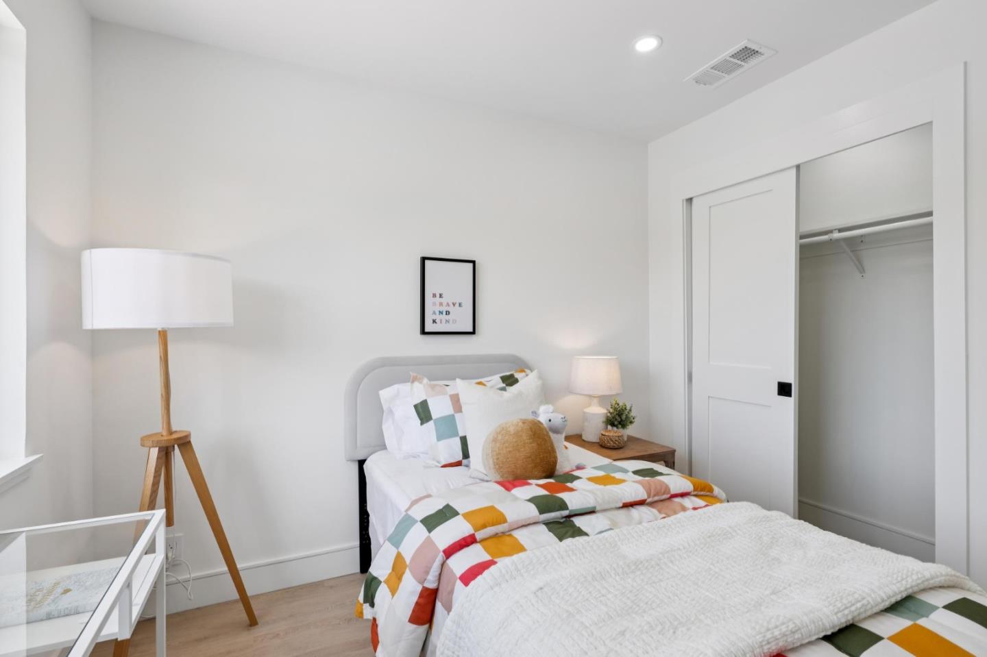 2 Celia Court Pacifica, CA 94044 - Photo 24 of 47 a bedroom with a bed and a table