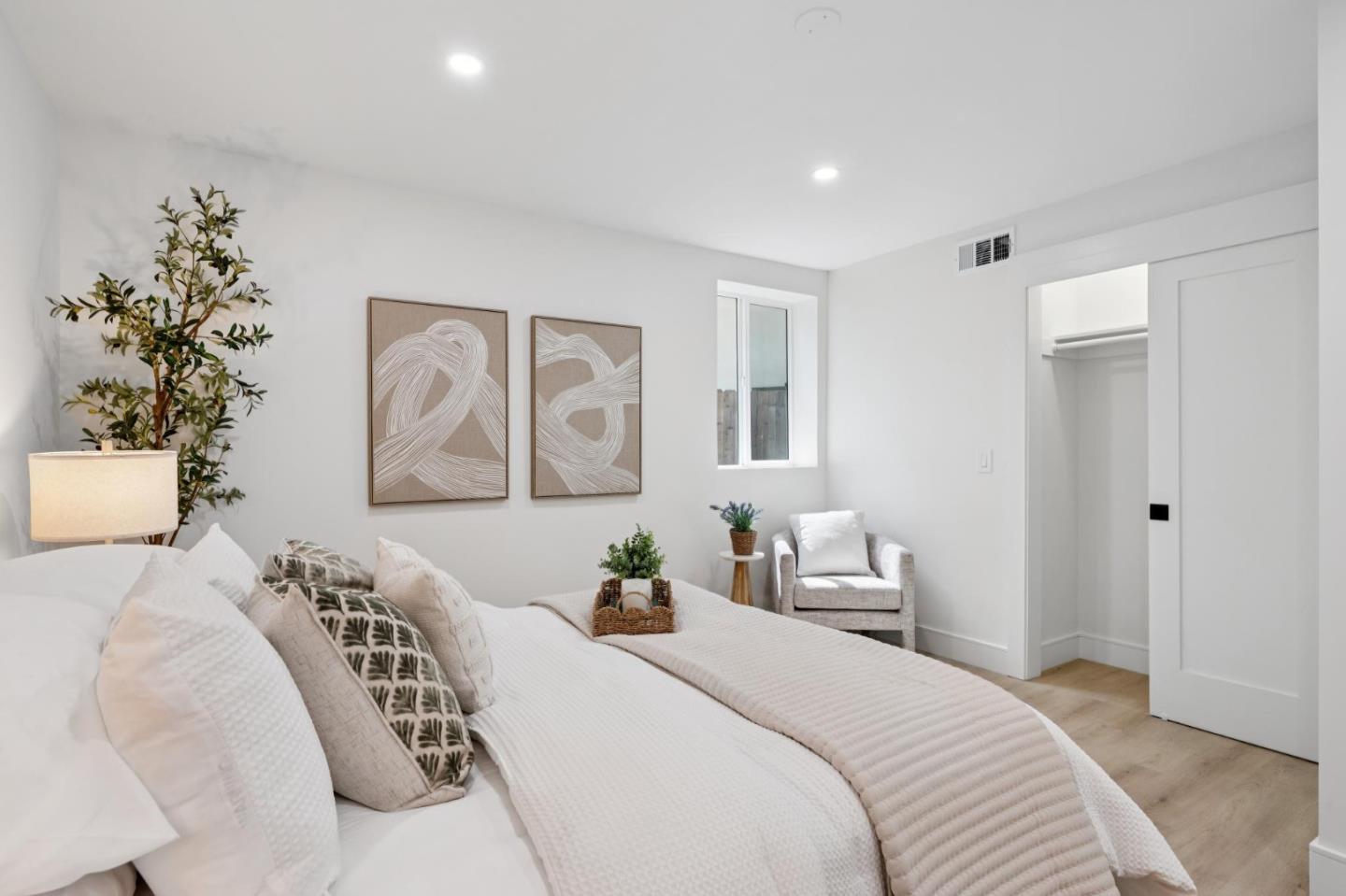 2 Celia Court Pacifica, CA 94044 - Photo 28 of 47 a bedroom with a large bed and a couch