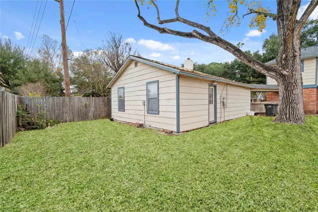 a view of a backyard with a garden