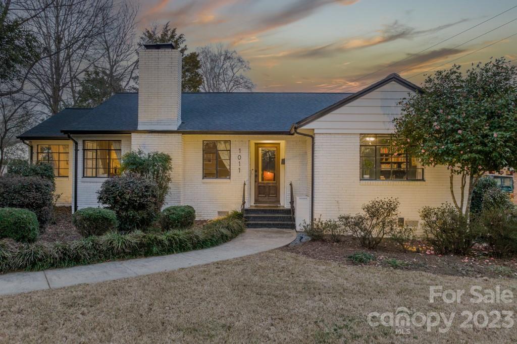 1011 Scaleybark Road Charlotte, NC 28209 - Photo 1 of 40 a front view of house with yard