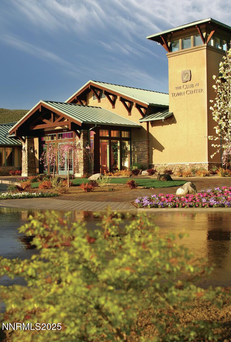 1640 Scott Valley Road Reno, NV 89523 - Photo 22 of 25 a front view of a building with swimming pool