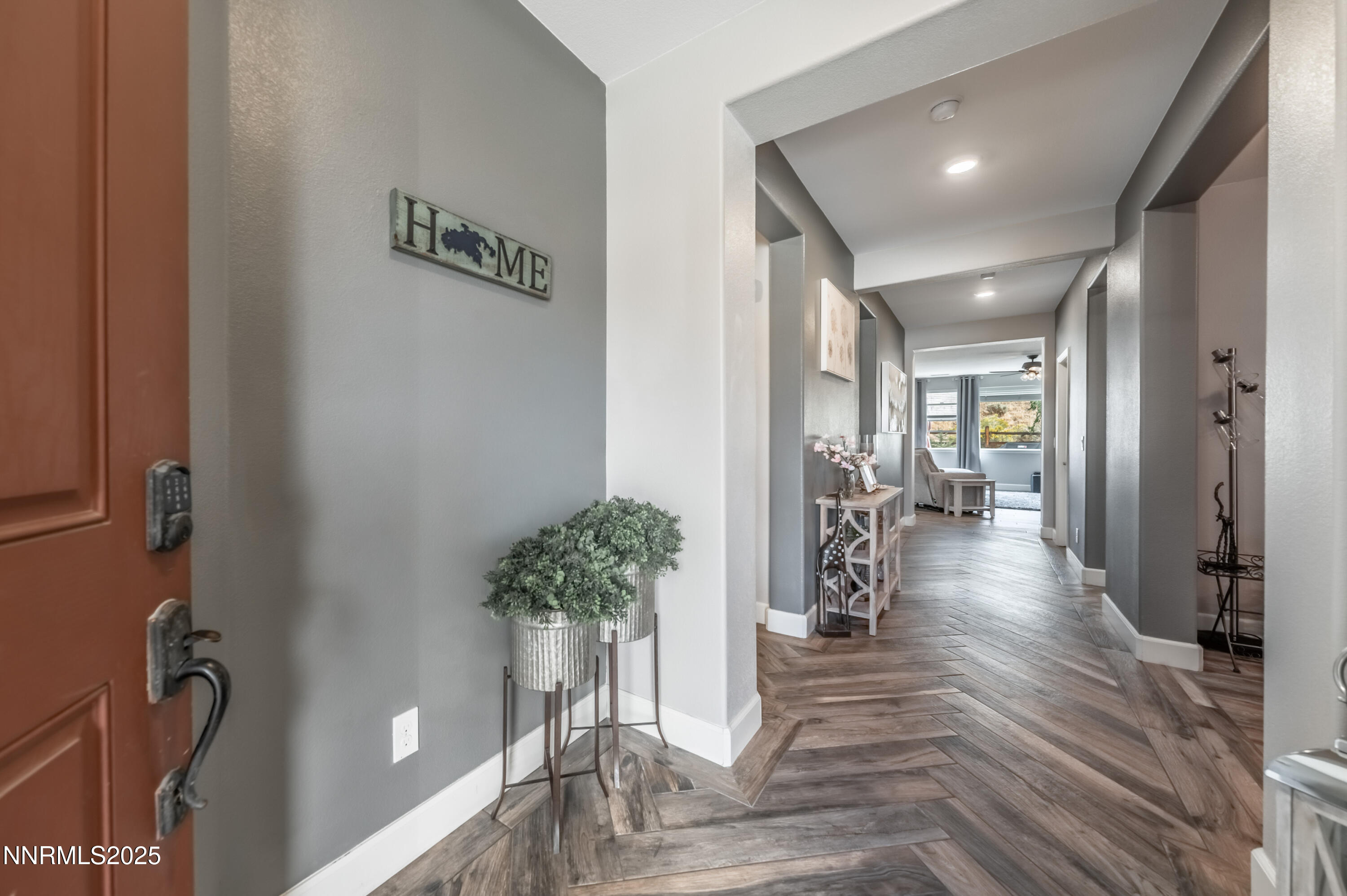 1640 Scott Valley Road Reno, NV 89523 - Photo 4 of 25 a view of a hallway with wooden floor