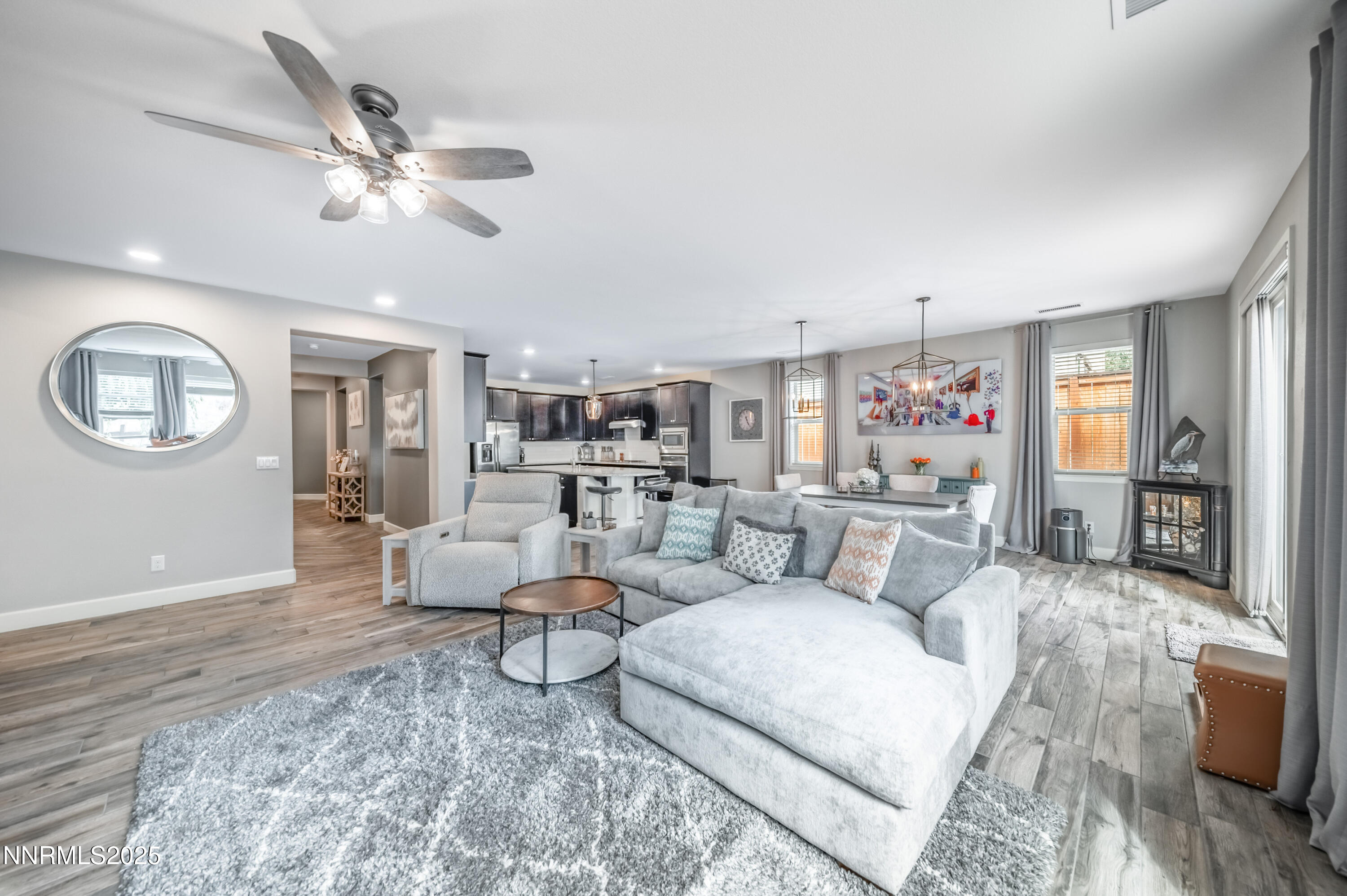 1640 Scott Valley Road Reno, NV 89523 - Photo 10 of 25 a living room with furniture and a wooden floor