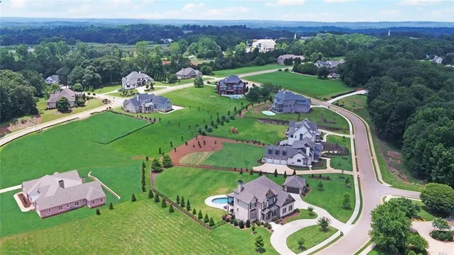 an aerial view of a golf course with outdoor space