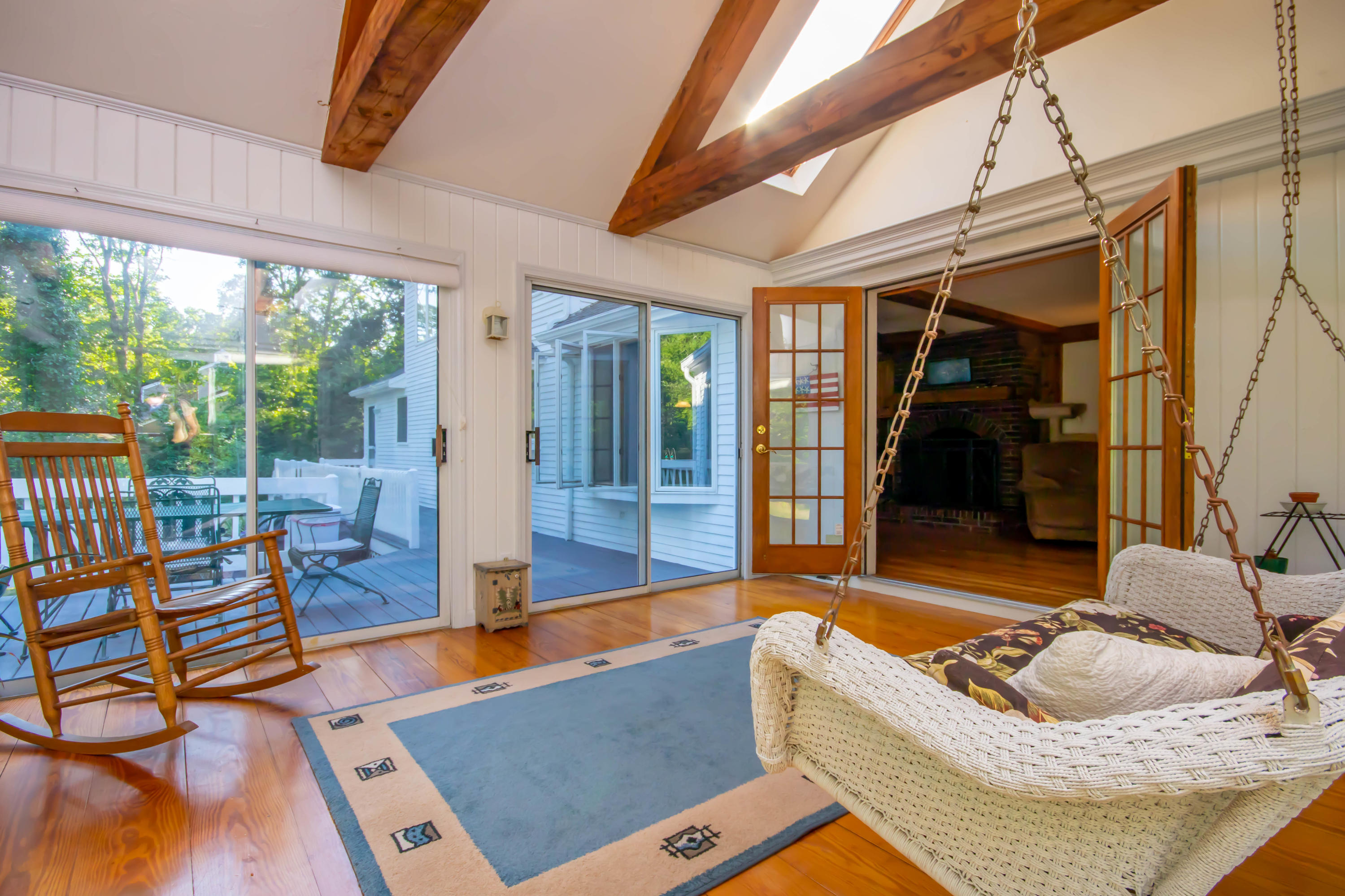 74 John Ewer Road Sandwich, MA 02563 - Photo 11 of 36 Sunroom opens to the back deck